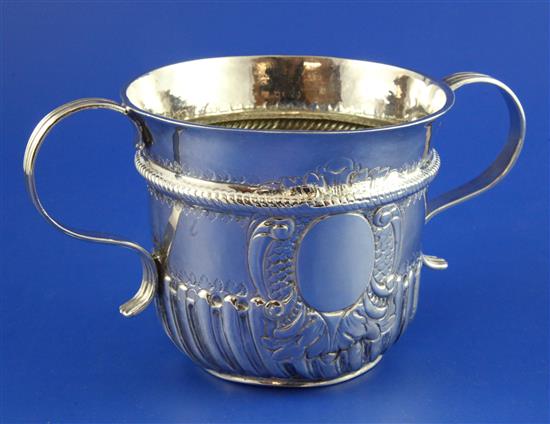 A Queen Anne silver porringer by Thomas Parr I, 10 oz.